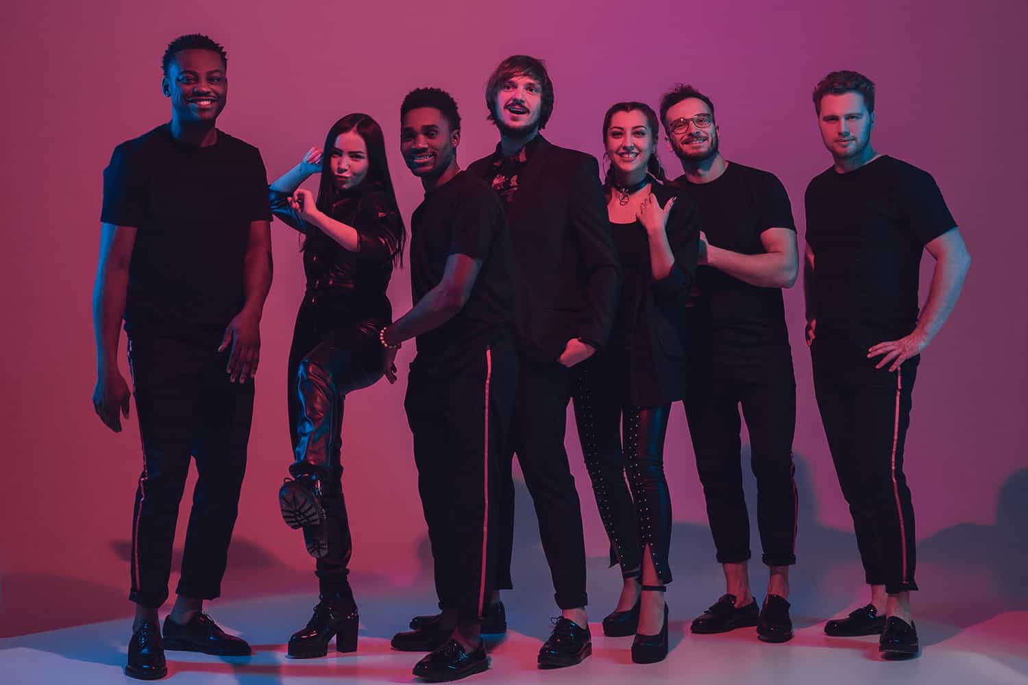 Band posing together before a live event.