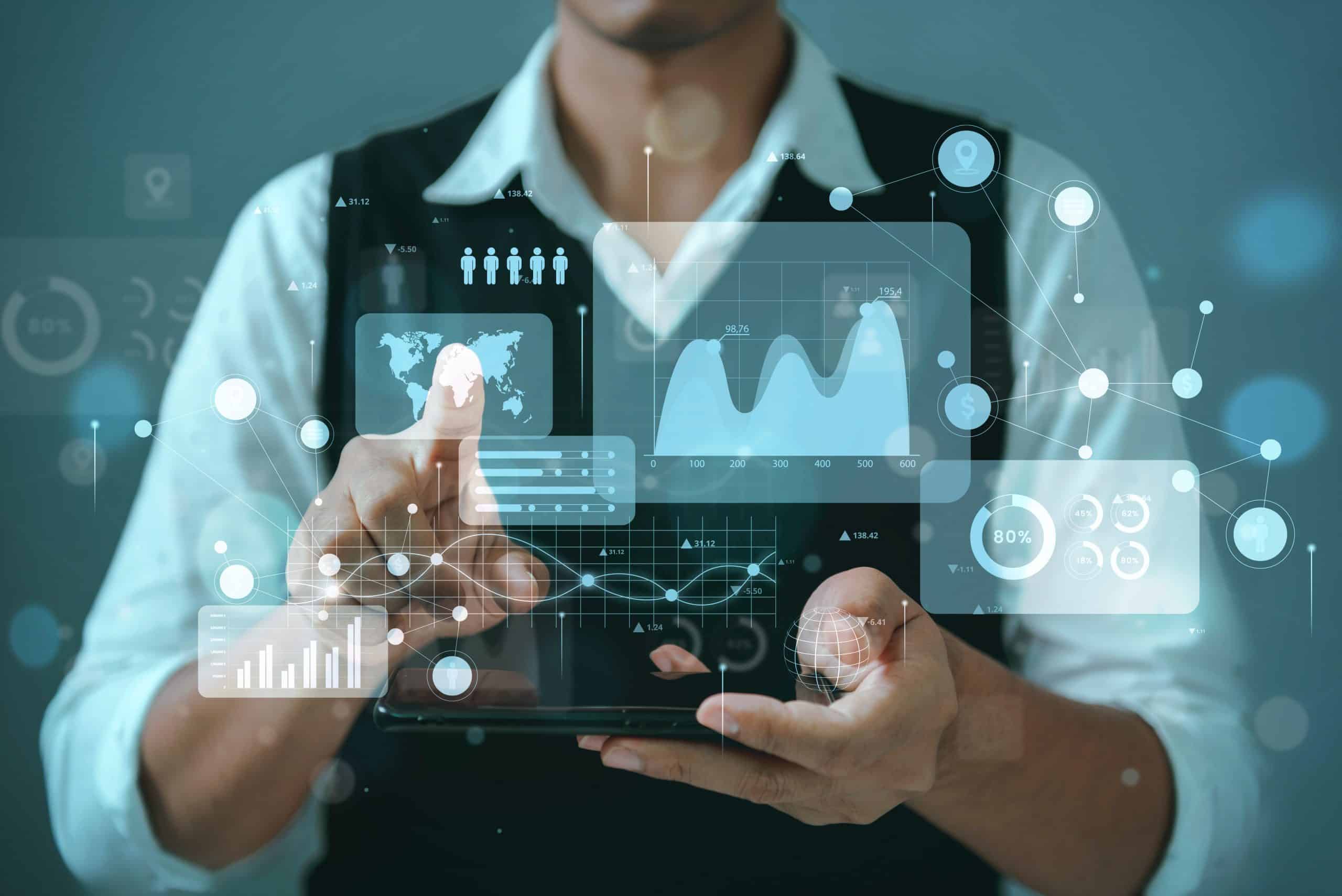 Man using tablet with business icons