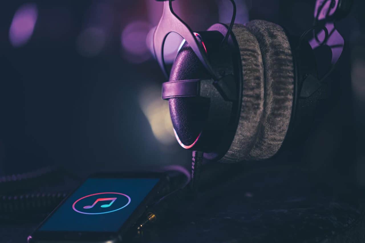 smartphone with music icon and headphones